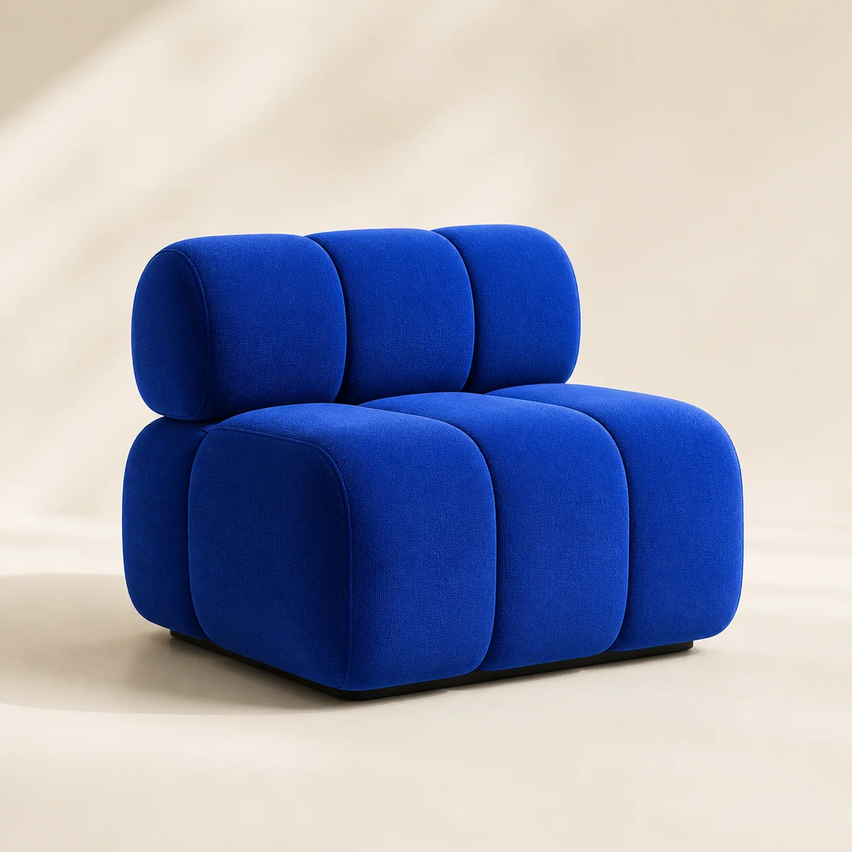 Cobalt-blue upholstered chair against a cream background, illustrating a clear product reference.